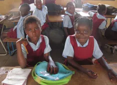 Orphans in Kitwe, Zambia, can attend school.
